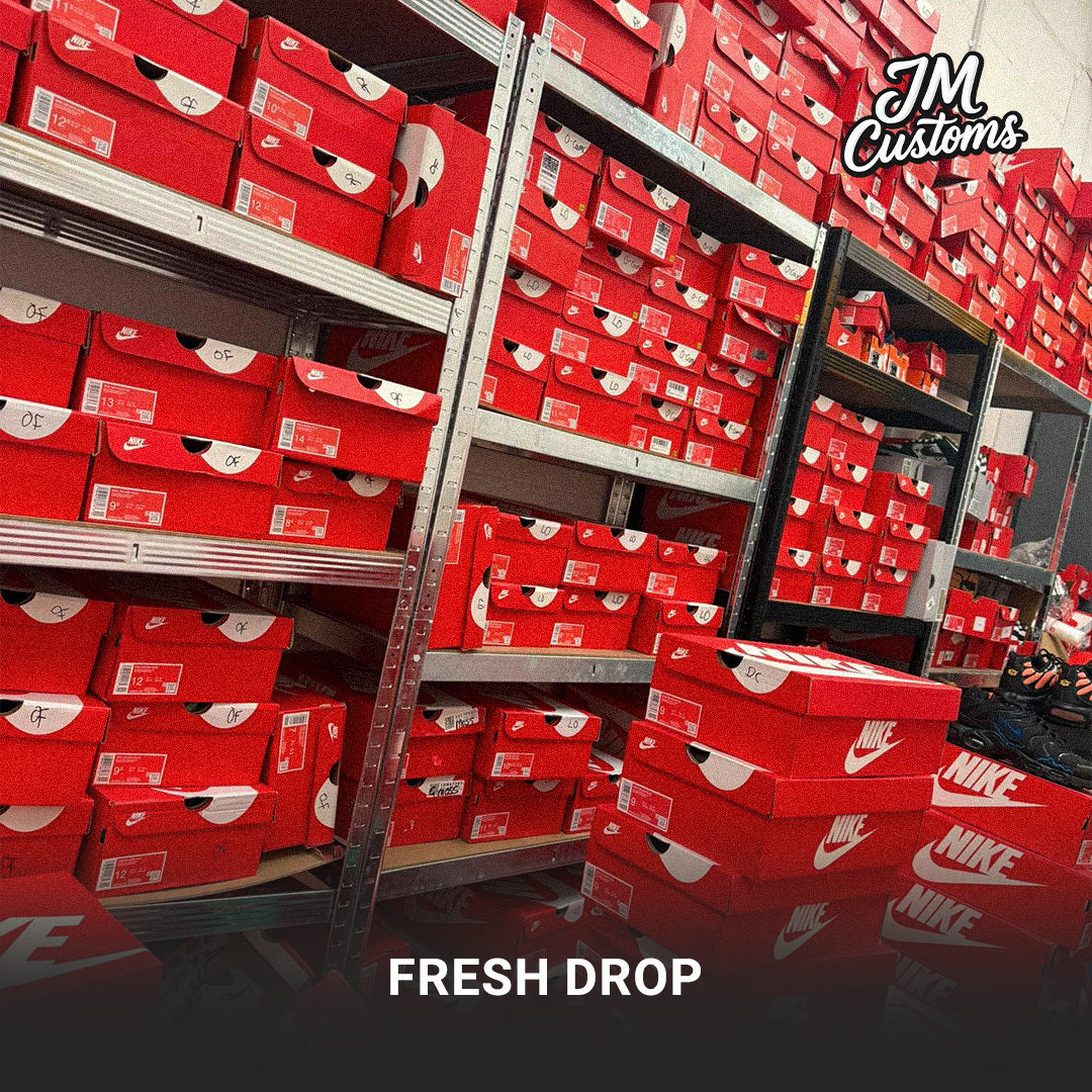 JM Customs stock room shelves of Nike boxes